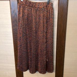 Pleated mid length Anthropologie skirt